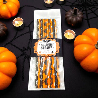 Orange and Black Halloween Straws on a black halloween background