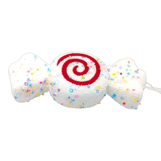 White nougat style Christmas ornament wrapped with rainbow confetti sprinkles, candyland aesthetic