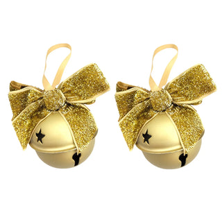 Two gold glittery bell ornaments with star designs on a white background