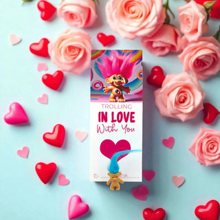 Product packaging with cartoon characters surrounded by pink and red hearts and roses on a light blue background.