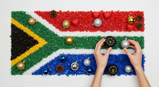 south african flag for handmade products and two hands