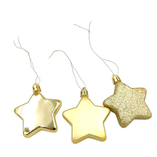 Three gold star-shaped ornaments on a white background