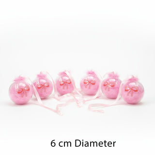 Set of pink decorative balls with ribbons on a white background, labeled '6 cm Diameter'. for a Nutcracker Ballet theme