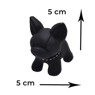Black dog-shaped keychain with measurements on a white background