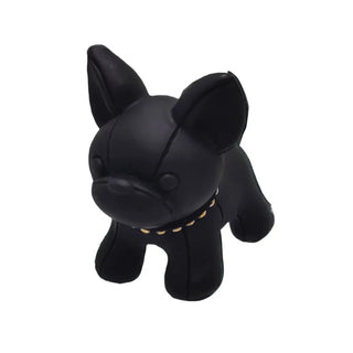 Black dog-shaped toy on a white background