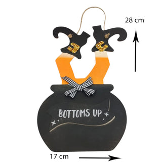 Decorative item with witch hats and a pot labeled 'Bottoms Up' on a white background.