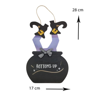 Decorative Halloween ornament with witch legs in a cauldron and 'Bottoms Up' text, with measurements indicated.