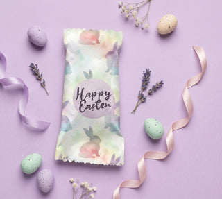 Easter-themed package with 'Happy Easter' text on a purple background with eggs and ribbons.