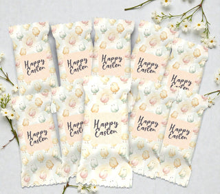 Set of eight Easter-themed packages with 'Happy Easter' text and pastel designs on a light background.