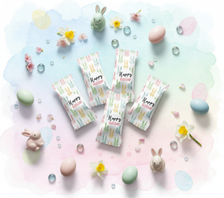 Packaged snacks with bunny designs on a pastel background with Easter elements.