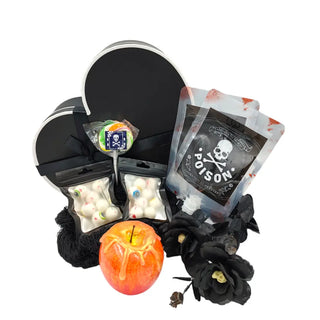 black heart-shaped box, Apple, 2 x black skull roses, lollipop, 2 x candy eye packets, 2 x IV Drip Bags