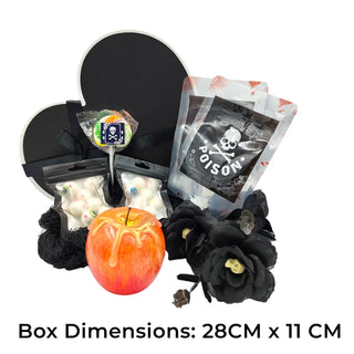Halloween-themed product set with apple, flowers, and packaging on a white background