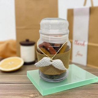 Dried fruit snack gift shaped like wings with elegant packaging