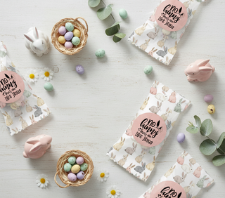 Easter-themed products including boxes, eggs, and decorative items on a light wooden surface.