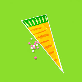 Illustration of a carrot with seeds on a green background