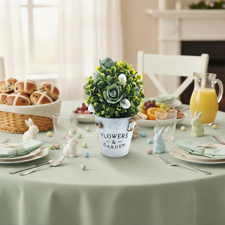 Easter-themed table setting with a topiary in a pot labeled 'Flowers & Garden'.