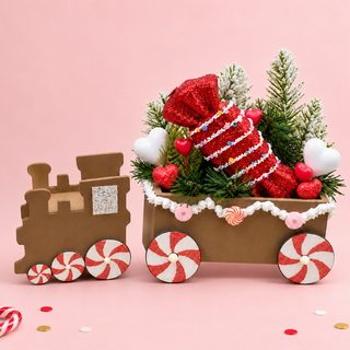 Peppermint Express Train Centerpiece styled on a blush pink backdrop