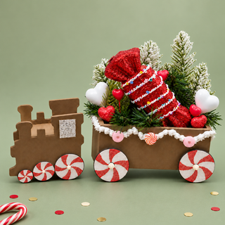 Peppermint Express Train Centerpiece with frosted pine and faux sweets on sage green
