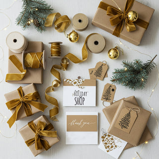Gifts wrapped in brown paper with gold ribbons and tags on a white surface.
