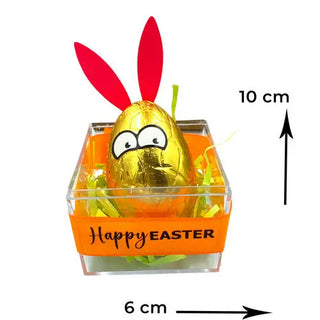 gold foil egg with bunny ears and eyes and the words happy easter