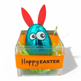 teal foil egg with bunny ears and eyes and the words happy easter