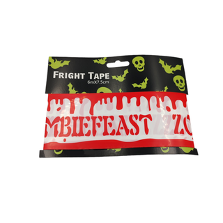 creepy and bloody tape with the words ZOMBIEFEAST written and a black bag with green skull faces