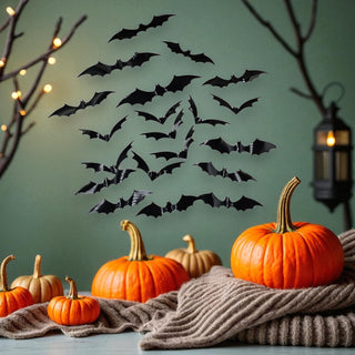 Halloween-themed decor with pumpkins, bats, and a lantern on a green background.