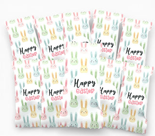 Three Easter-themed eggswith bunnies and 'Happy Easter' text on a white background.