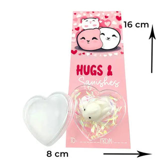 squishy toy with a heart design and pink valentines card
