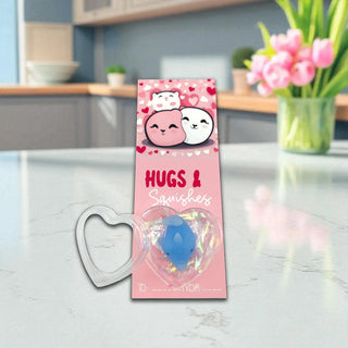 Packaged product with cartoon characters and 'Hugs & Squishes' text on a kitchen counter.