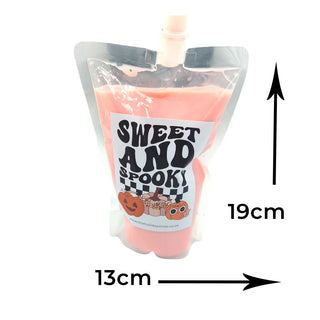 Pink pouch with a 'Sweet and Spooky' label, showing dimensions on a white background.