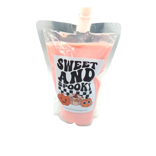 Pink iv bag with 'Sweet and Spooky' label on a white background