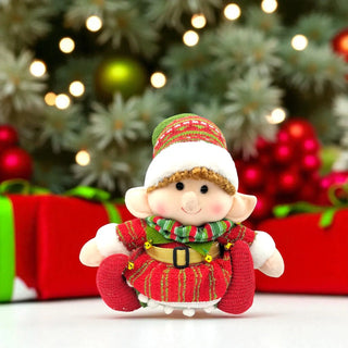 Decorative elf figurine with a festive background featuring lights and presents.