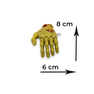 Zombie hand prop with measurements on a white background