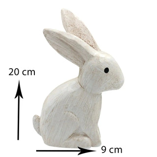 White rabbit figurine with measurements on a white background