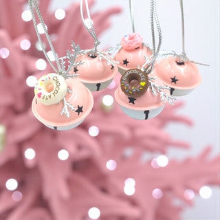Donut-shaped necklaces with pink and white backgrounds