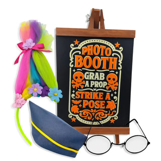 Photo booth props including a colorful wig, blue hat, and glasses on a white background.