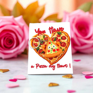 Card with heart-shaped pizza design and 'You have a pizza my heart!' text, surrounded by pink roses.