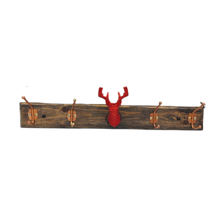 Wooden coat rack with red deer head design on a white background