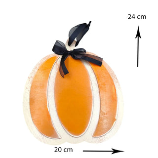 Decorative pumpkin with a black bow, shown with measurements on a white background