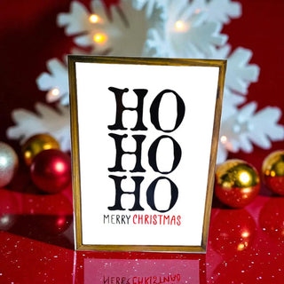 Festive “Ho Ho Ho” Christmas Wall Sign The Holiday Shop