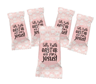 Pink Easter-themed eggs with text on a white background