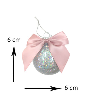 Decorative ornament with a pink bow and glittery ball, size indicated as 6 cm.