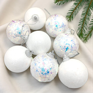 Soft iridescent Snowberry baubles with a pearl shimmer finish, perfect for a dreamy white Christmas tree look.