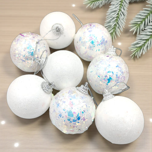 Soft iridescent Snowberry baubles with a pearl shimmer finish, perfect for a dreamy white Christmas tree look.