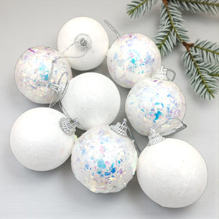 Soft iridescent Snowberry baubles with a pearl shimmer finish, perfect for a dreamy white Christmas tree look.