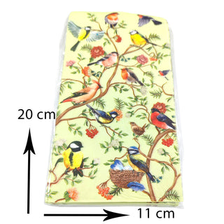 Folded fabric with bird and floral pattern, measuring 11 cm x 20 cm.