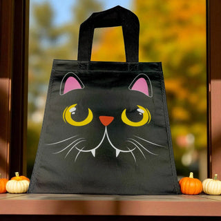 Black cat face tote bag with pumpkins on a windowsill