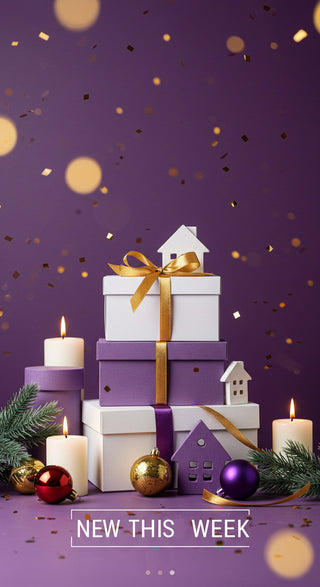 Stack of gift boxes with a candle and decorative items on a purple background with confetti.