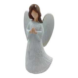 Angel figurine with white wings and a long, flowing robe on a white background